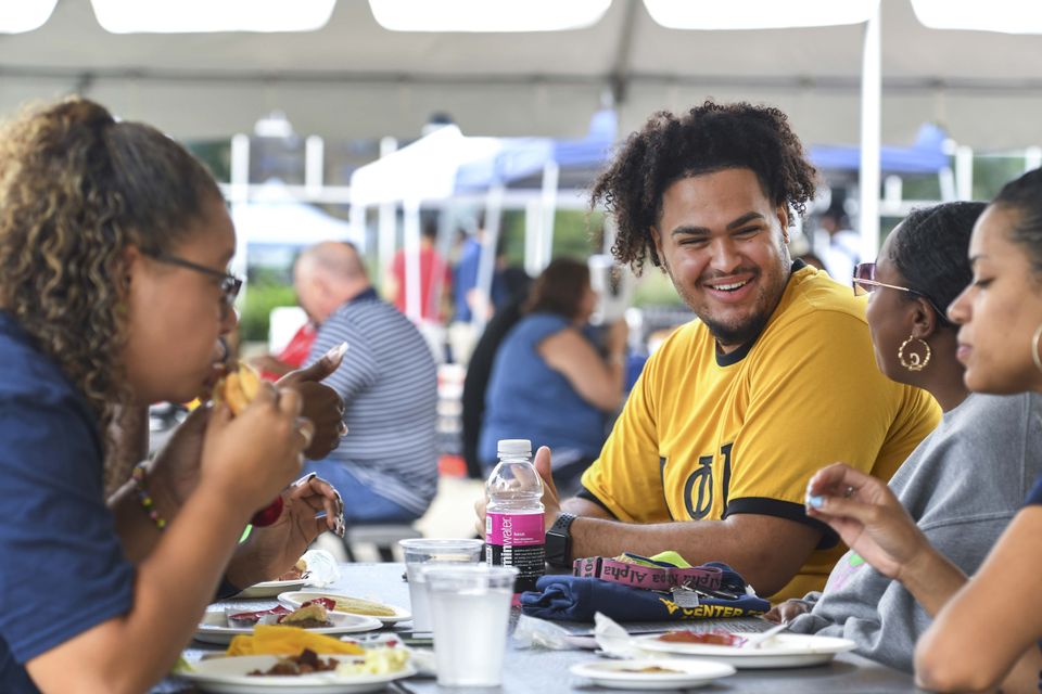 Students enjoying a meal at a Center for Black Research Culture and Research